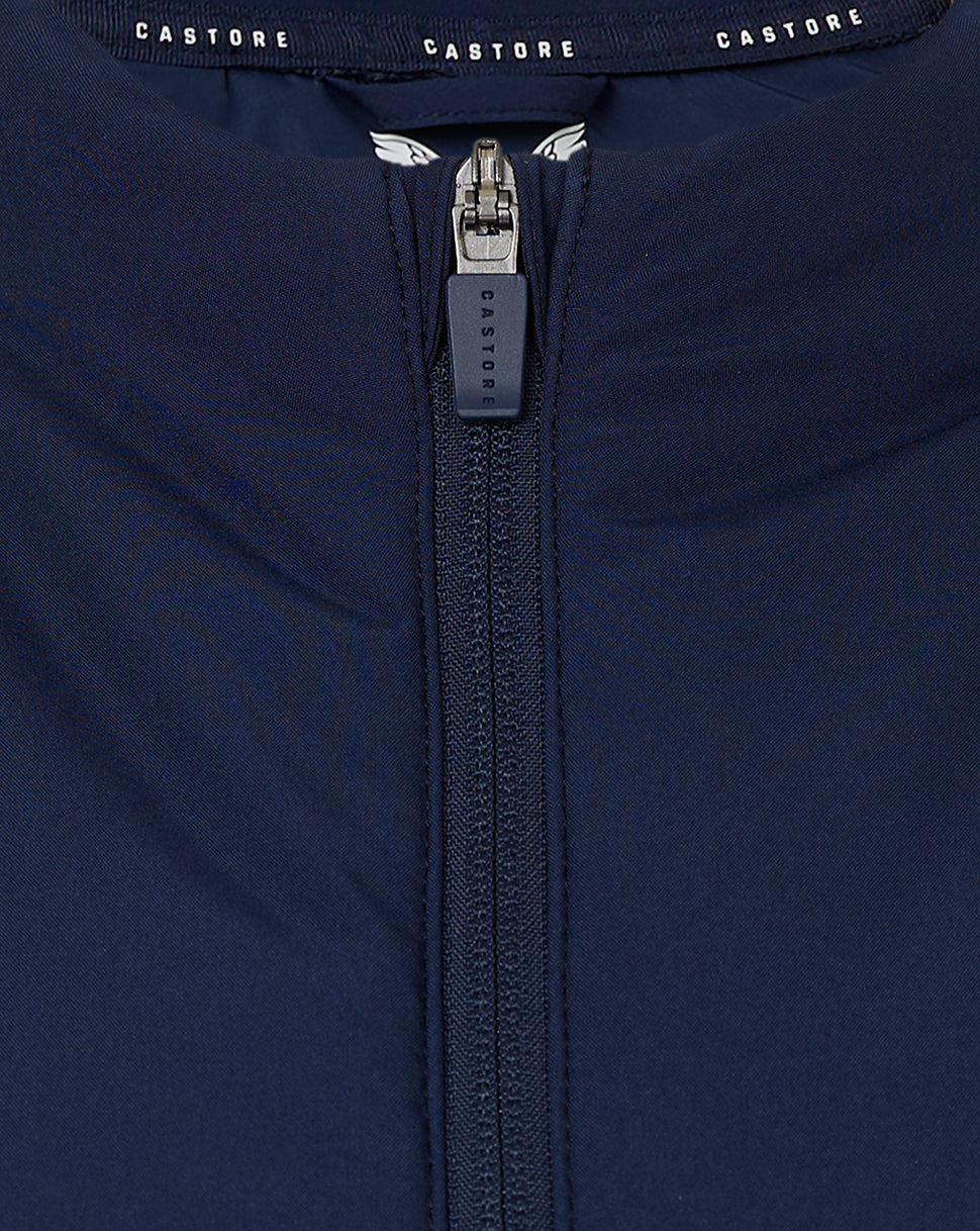 Rear view showing bold Honda and HRC logos across the upper back of the navy sleeveless gilet