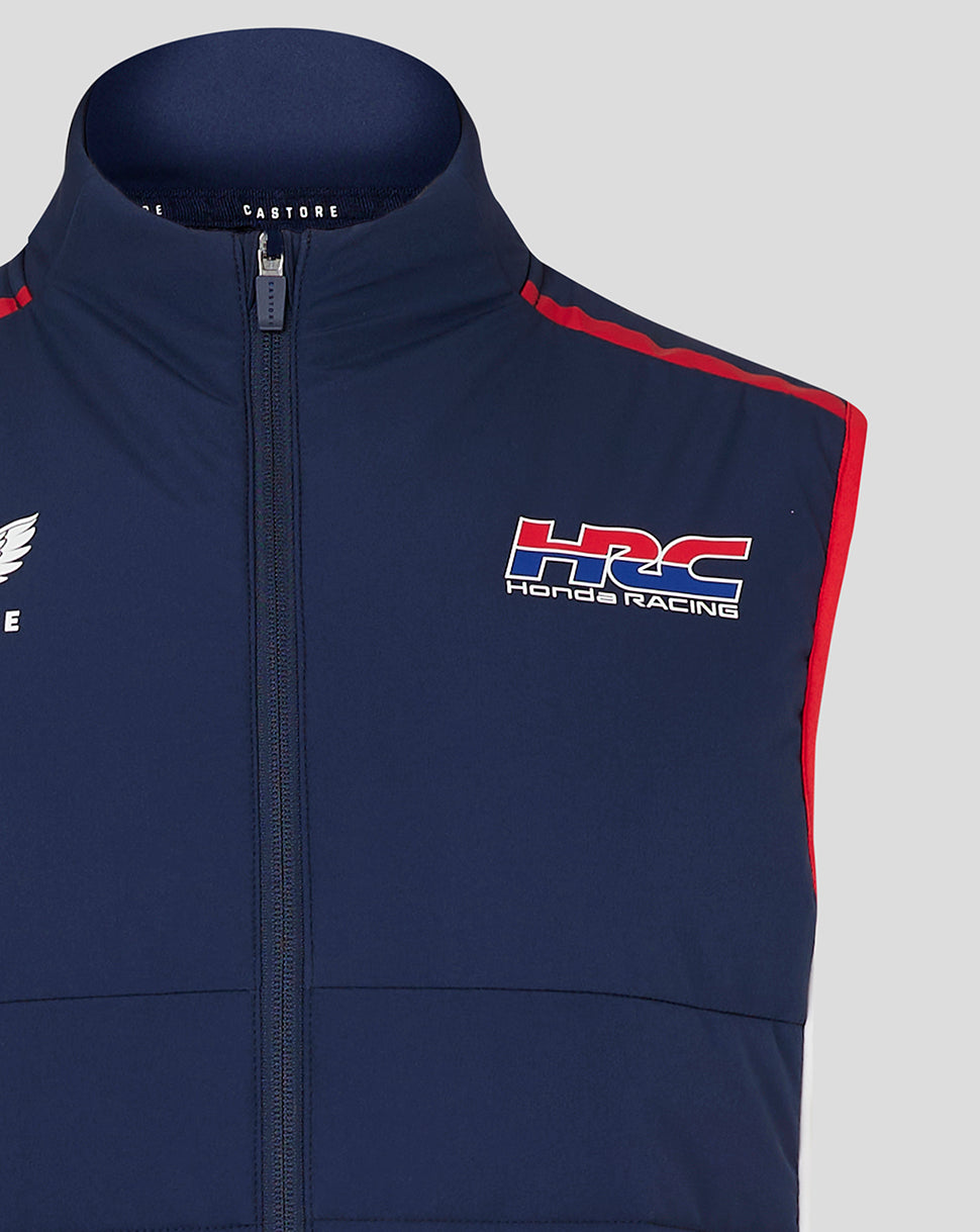 Front view of navy Honda racing gilet with center zip, Castore wing logo on left chest and HRC emblem on right chest.
