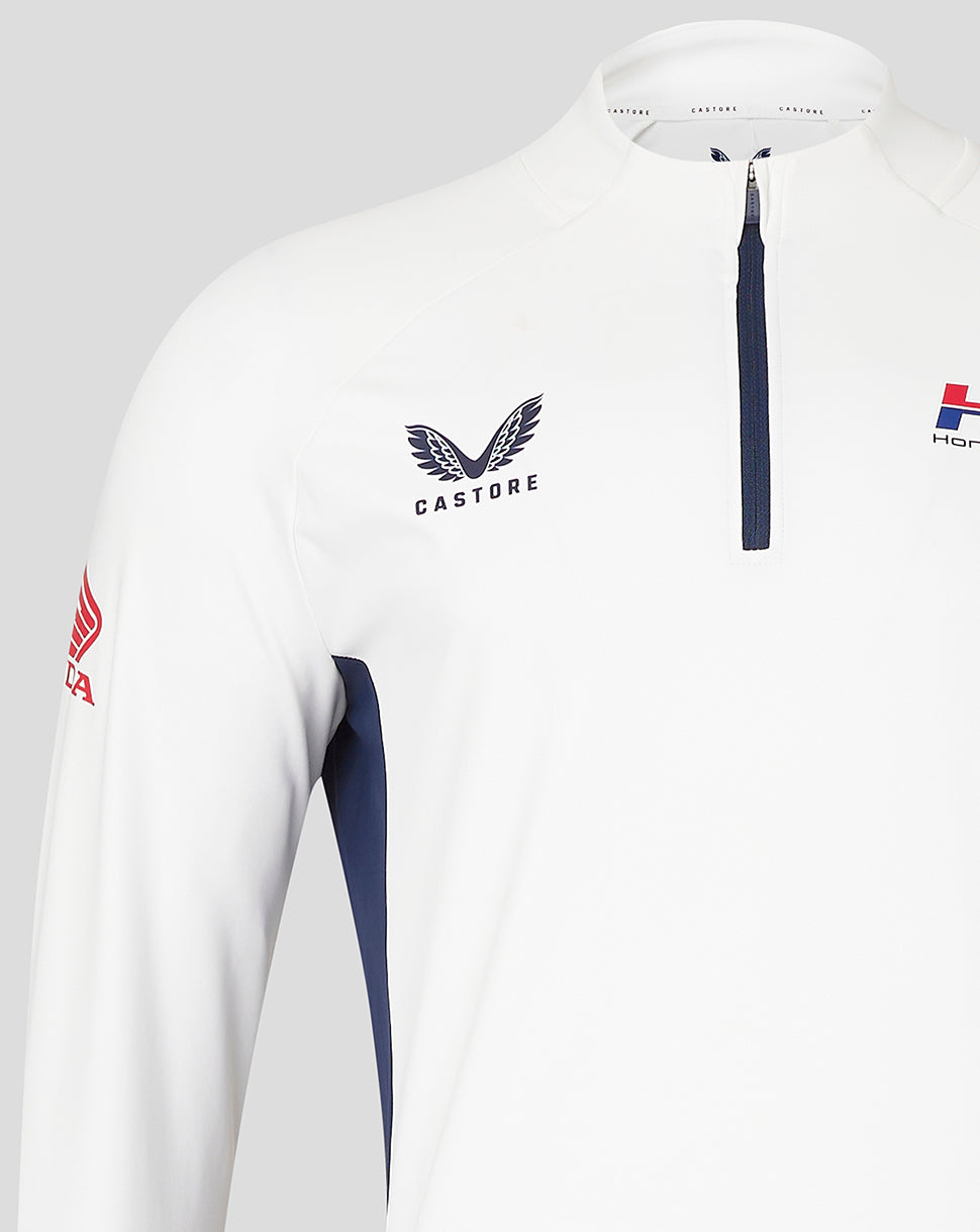 White Honda Racing quarter zip top with Castore wing logo on chest, navy center zip, navy side panels and red Honda sleeve patch