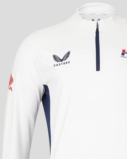 White Honda Racing quarter zip top with Castore wing logo on chest, navy center zip, navy side panels and red Honda sleeve patch