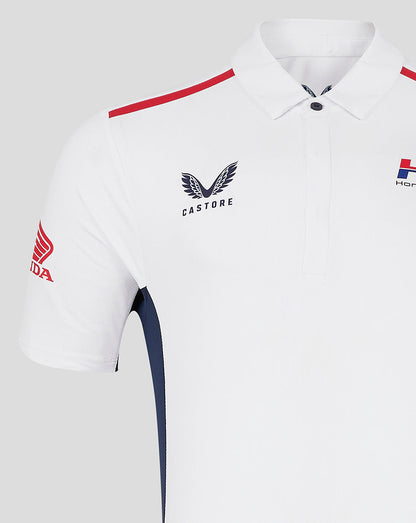 White unisex Honda HRC polo with red shoulder stripe and navy side panels, Castore branding on chest and Honda Repsol logos