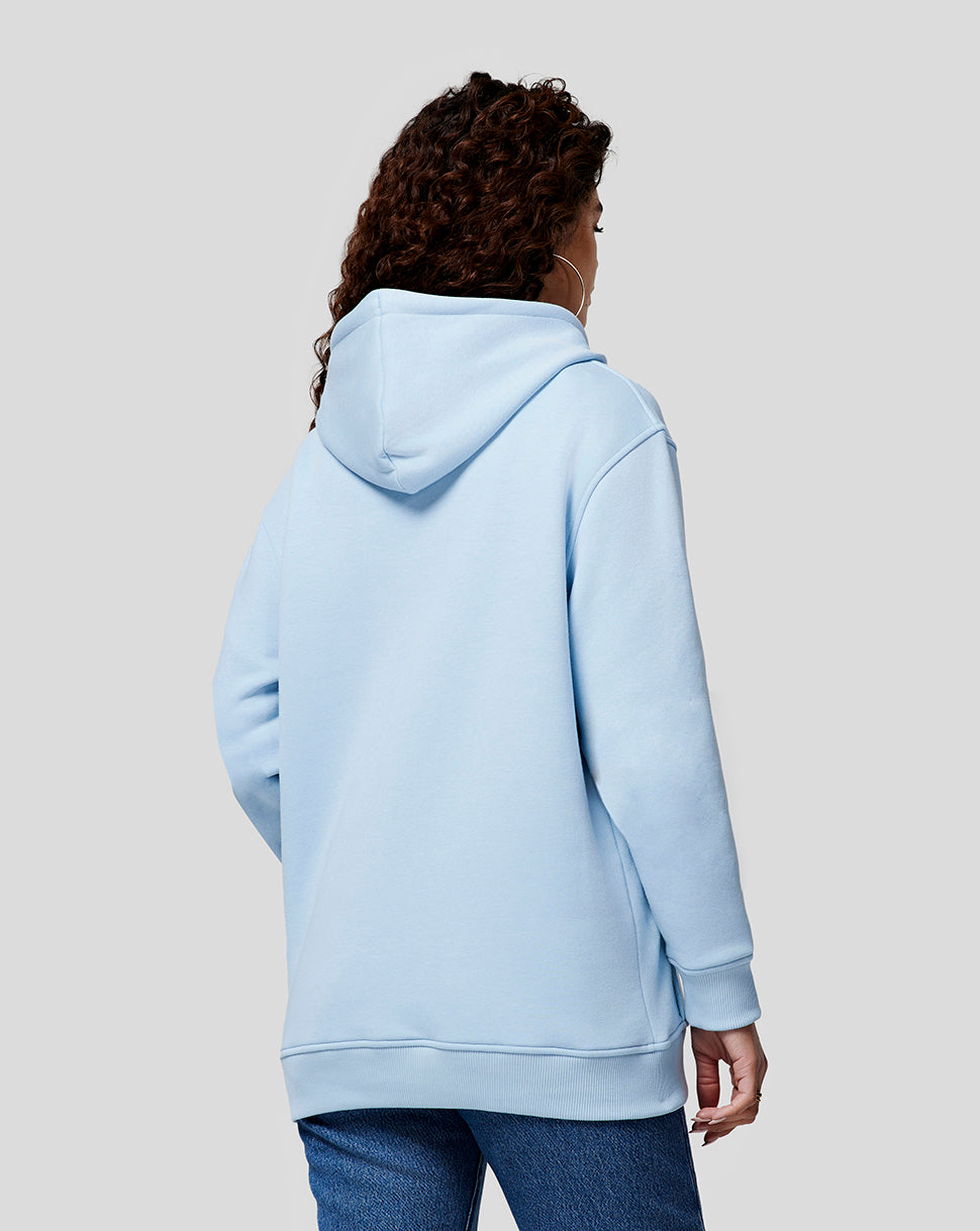 Back view of a Dream Blue Oracle Red Bull Racing unisex hoodie worn by a model.