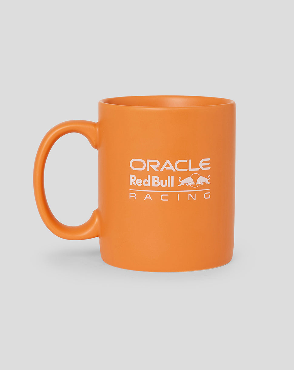 Bright orange porcelain mug featuring Oracle Red Bull Racing branding