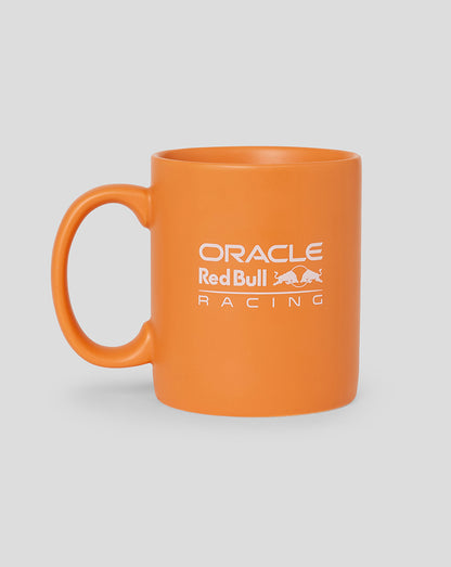 Bright orange porcelain mug featuring Oracle Red Bull Racing branding