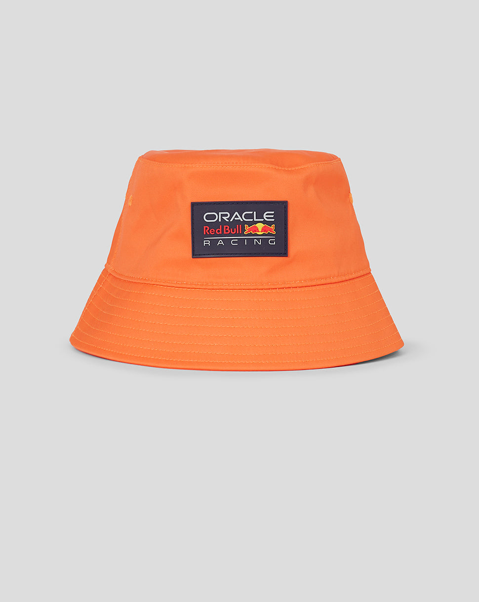 Orange unisex bucket hat with Oracle Red Bull Racing patch on front and small eyelets for ventilation
