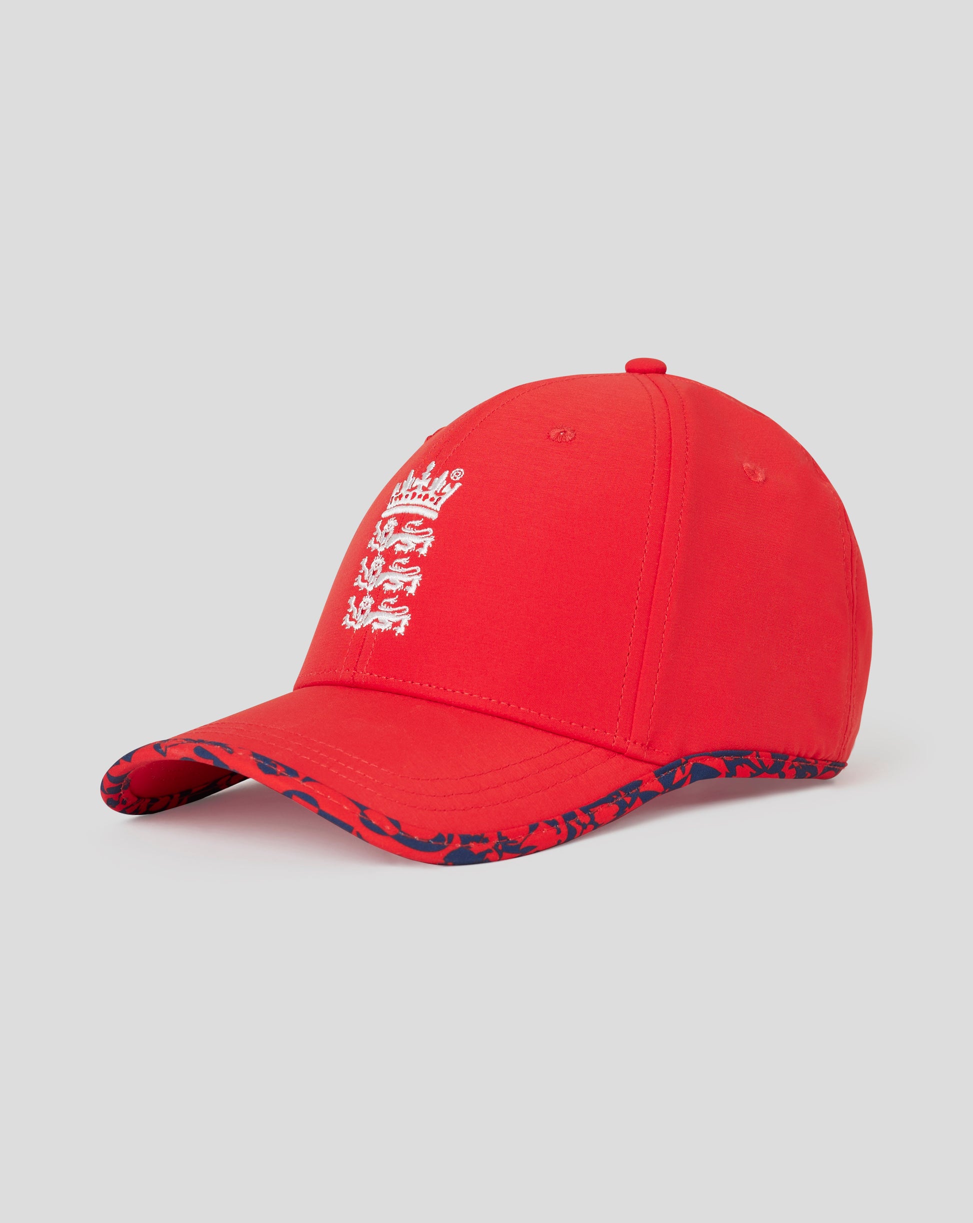 Fiery red England cricket T20 cap with white crest embroidery and a patterned brim edge