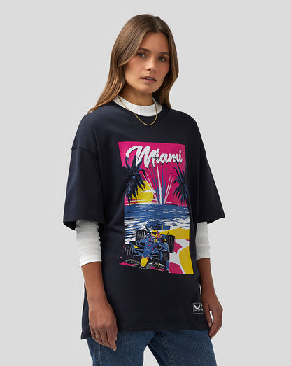 Female model wearing navy Miami graphic oversized T-shirt with colorful front print and white layer underneath