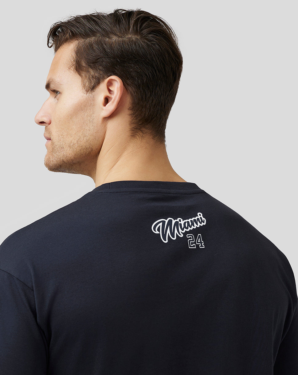 Model wearing navy Miami oversized T shirt back view highlighting the white Miami 24 graphic at the neckline.
