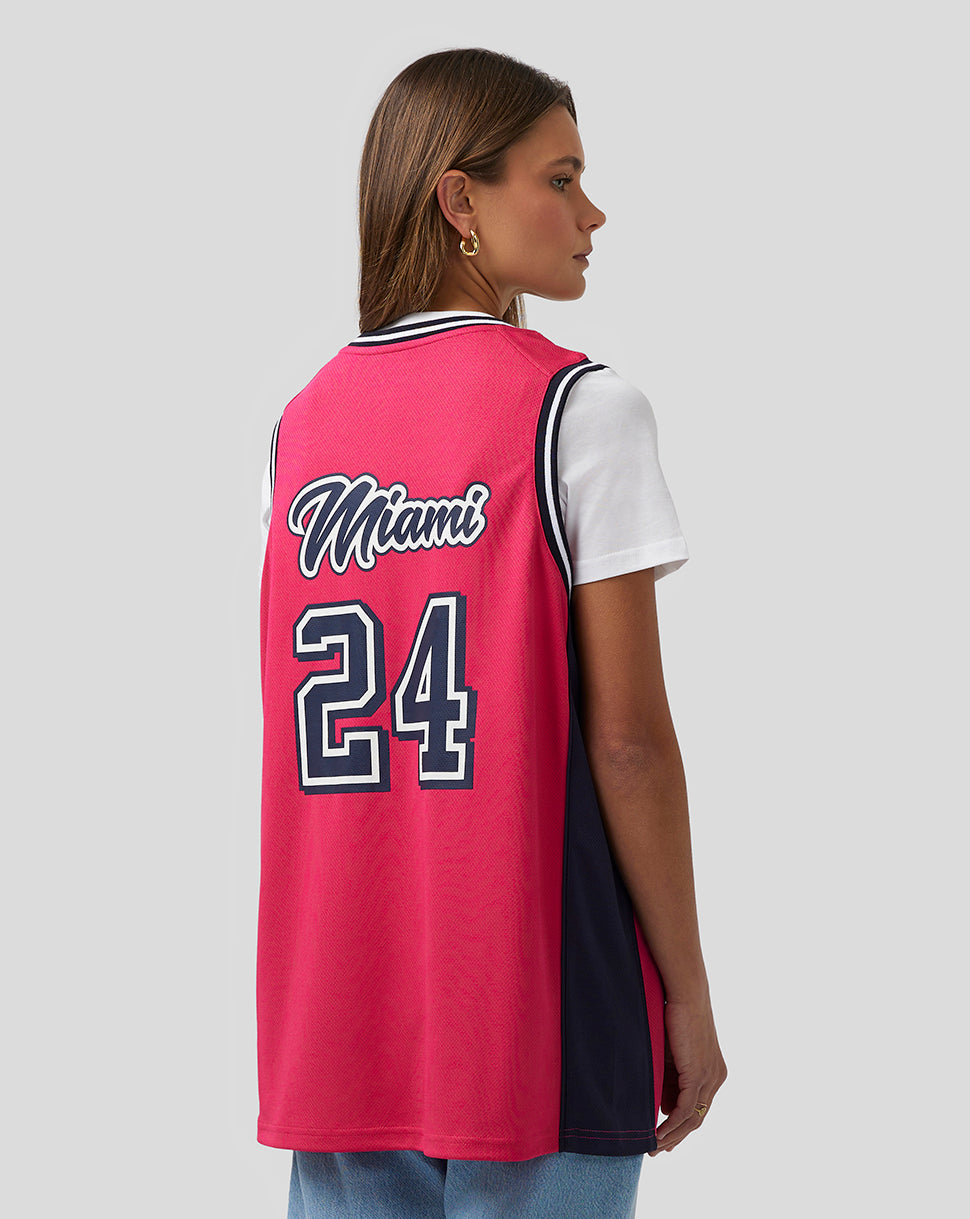 Back view of bright pink Miami basketball jersey with Miami script and number 24