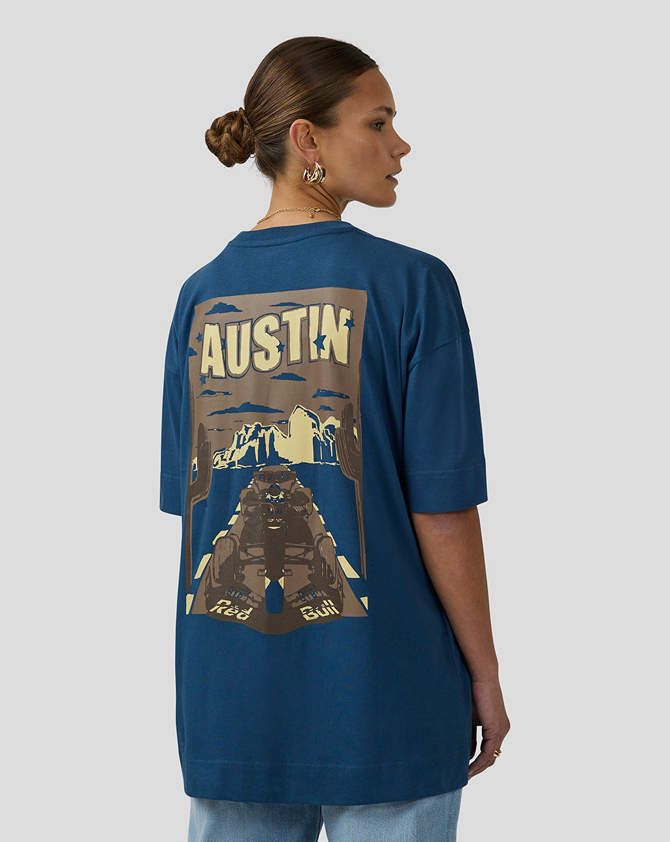 Profile view of a man wearing the blue Oracle Red Bull Racing Austin T Shirt showing the bold back graphic