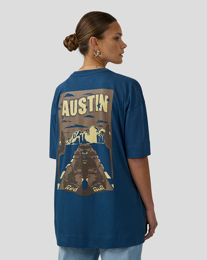 Profile view of a man wearing the blue Oracle Red Bull Racing Austin T Shirt showing the bold back graphic