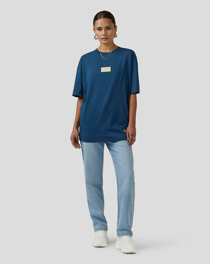 Model wearing blue Oracle Red Bull Racing Austin short sleeve T shirt with a small chest label.
