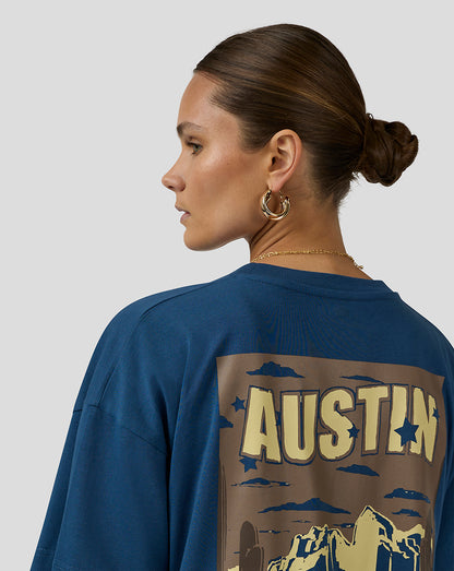 Back view of a blue Oracle Red Bull Racing Austin T shirt showing a large Austin graphic across the back