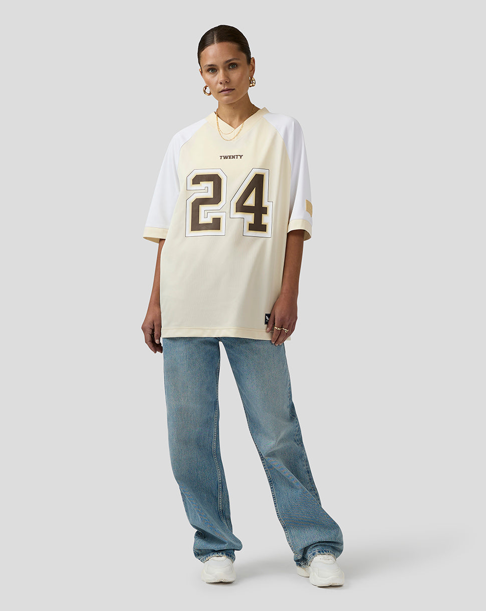 Cream Oracle Red Bull Racing Austin football jersey with white sleeves and a large 24 on the front