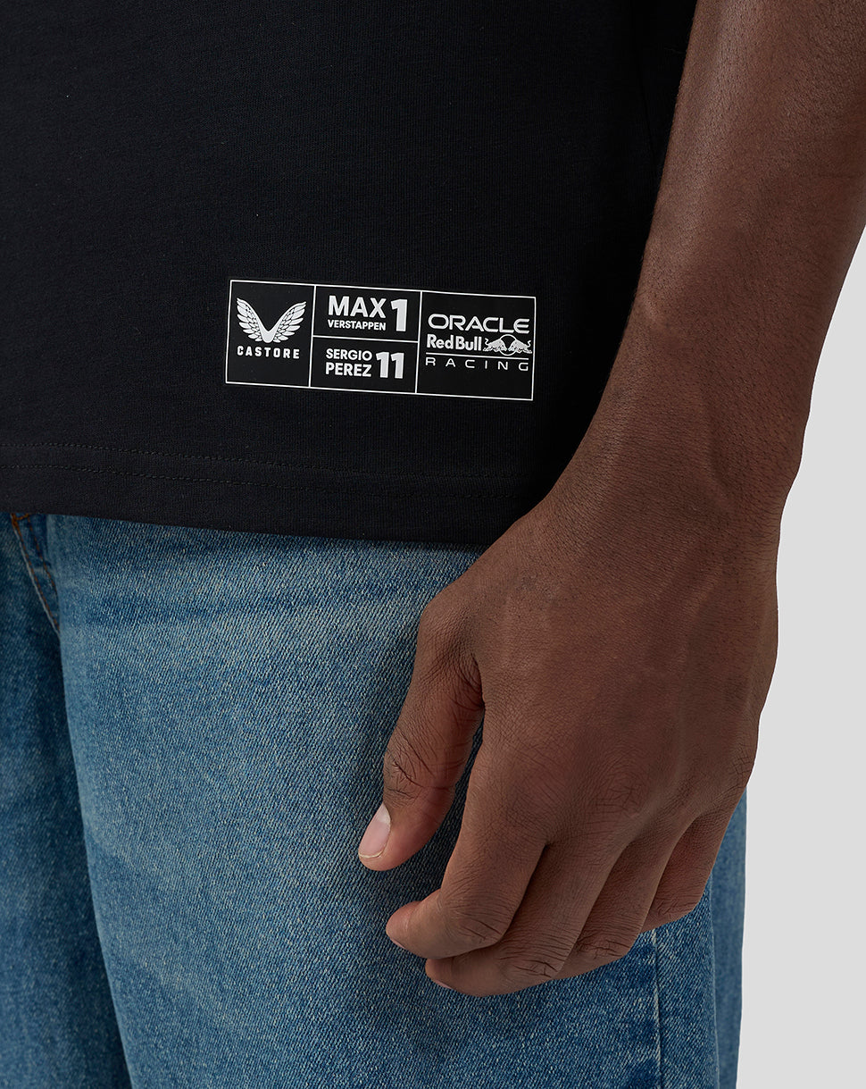 Side view of the black Las Vegas T shirt showing a small white label patch near the hem with racing branding.