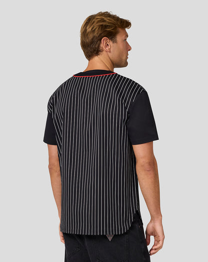 Back view of a black Las Vegas baseball jersey with white vertical pinstripes and red neck trim.