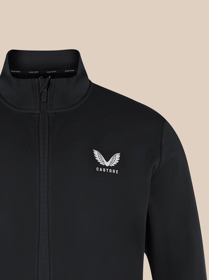 Front view of black unisex softshell jacket with front zipper and Castore wing logo on the left chest