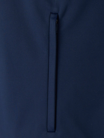 Navy unisex softshell jacket fabric close up with a vertical zip detail