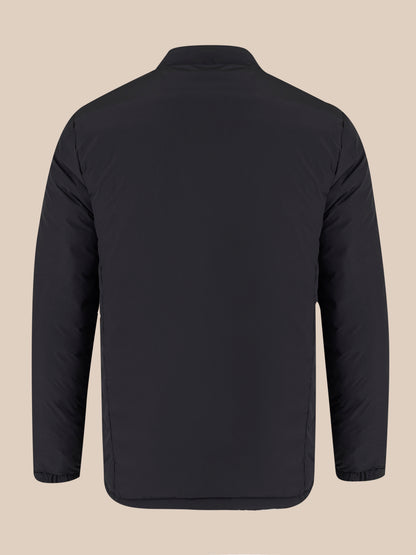 Back view of black padded jacket with high collar and clean lines