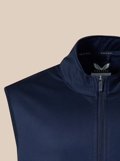 Close-up of navy Softshell Gilet collar and front zip with interior branding visible