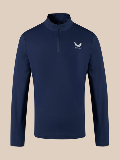 Navy 1/4 zip top with a white winged logo on the left chest and a short zip at the neck.