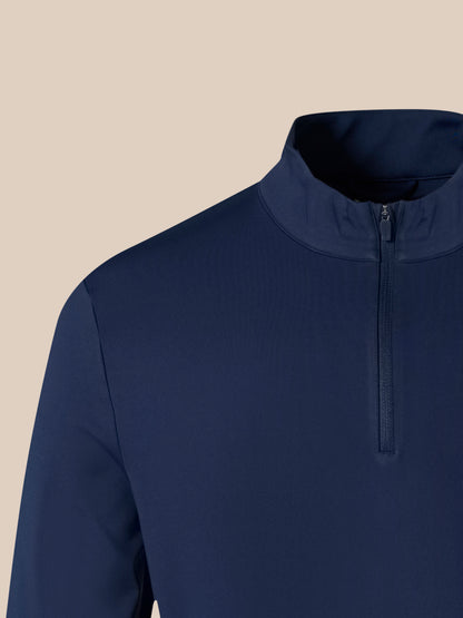 Close up of navy 1/4 zip top neckline with zipper and high collar