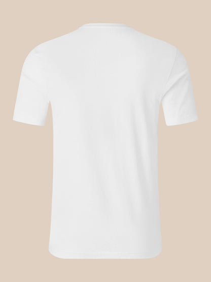 Back view of white cotton T shirt showing the neckline label with Castore branding