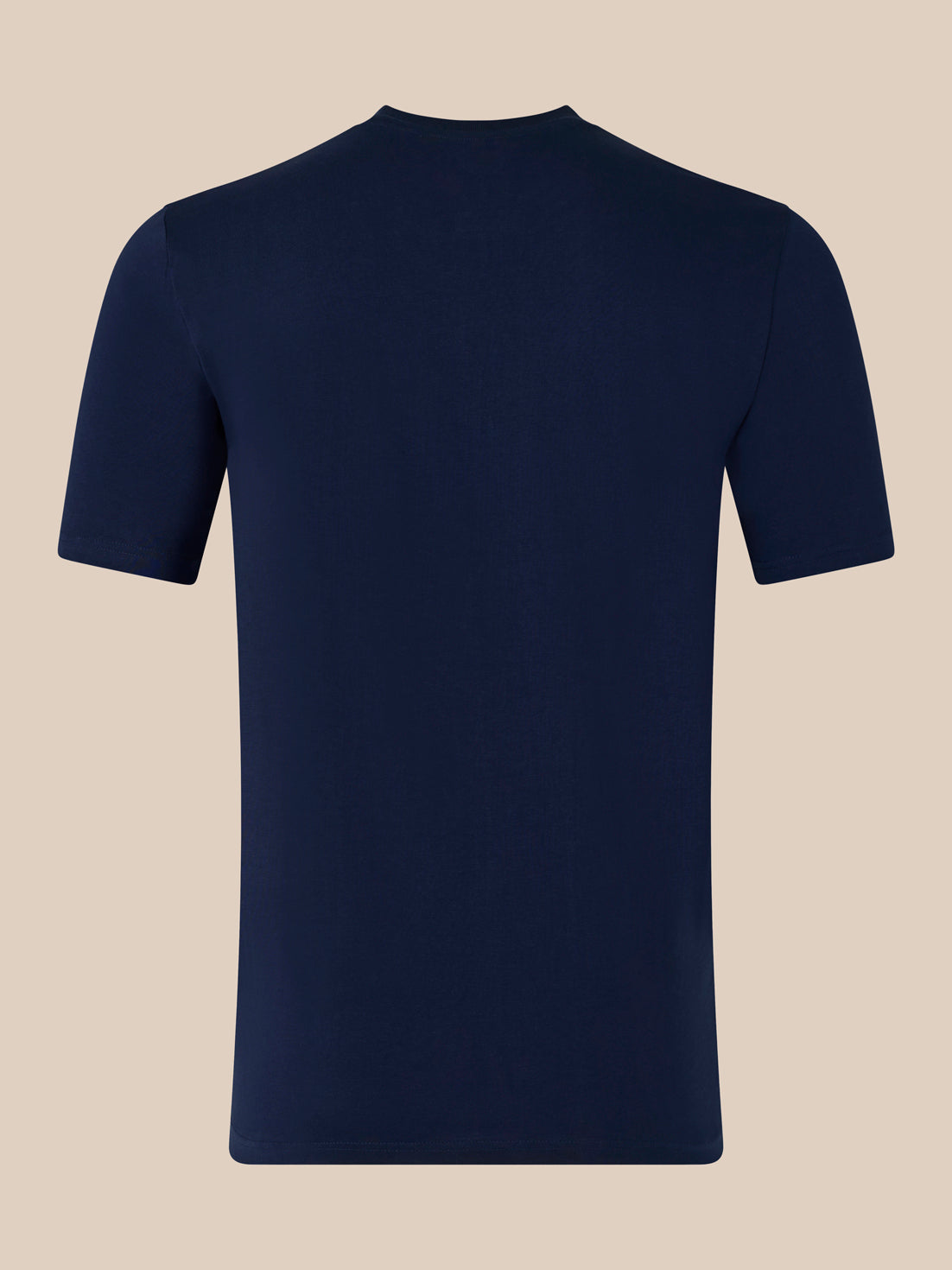 Close-up of navy T-shirt highlighting the white CASTORE logo across the chest and the interior neck label.