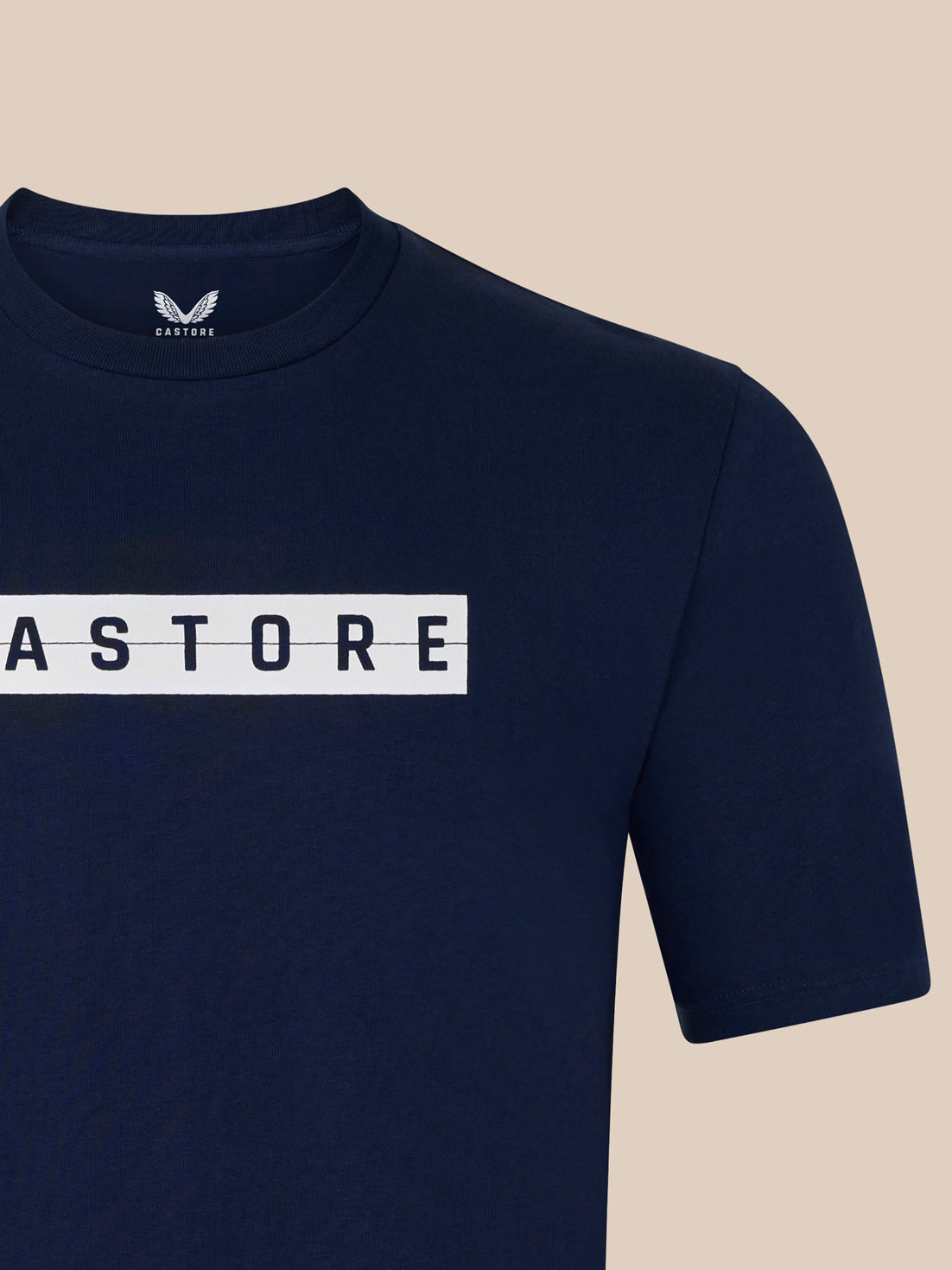 Navy T-shirt with bold CASTORE branding across a white rectangular strip on the chest.
