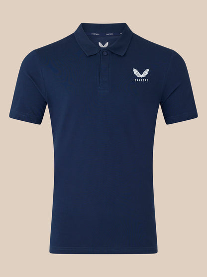 Navy short sleeve polo with white Castore wing logo on the left chest