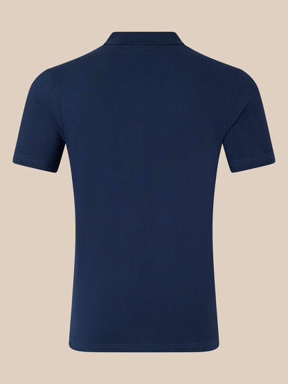 Back view of navy unisex cotton polo shirt with short sleeves and ribbed collar.