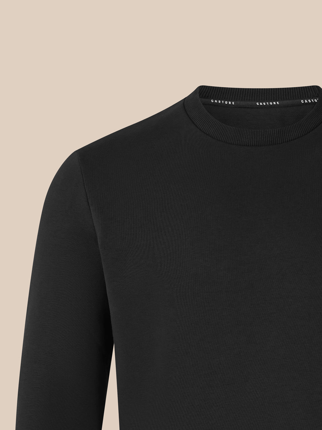 Crewneck Unisex Sweatshirt in black close up of ribbed collar and shoulder seam