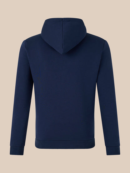 Back view of navy lifestyle hoodie with hood against a beige background