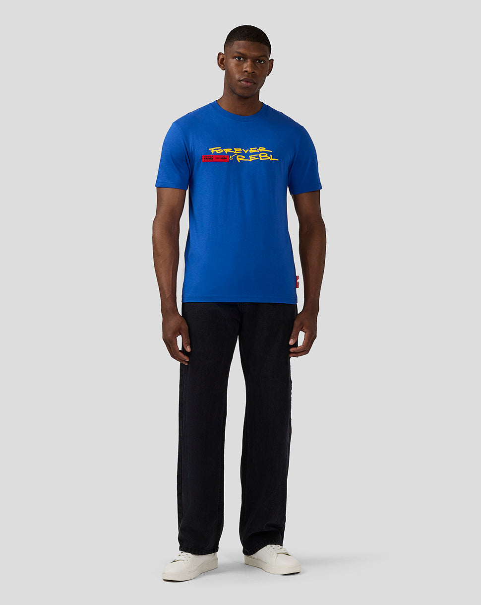 Front view of a male model wearing royal blue Oracle Red Bull Racing 20th Anniversary T shirt with bold yellow graphic.
