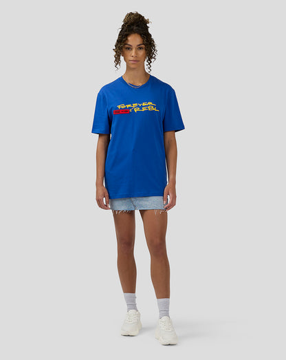 Woman wearing royal blue Oracle Red Bull Racing 20th anniversary short sleeve T shirt with chest graphic
