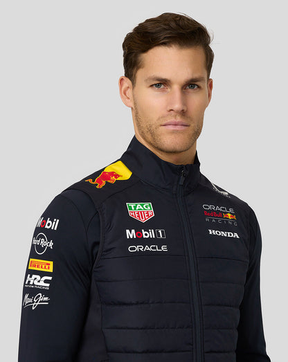 Front angled view of night sky Teamline Hybrid Gilet with center zip and sponsor logos on chest and shoulder