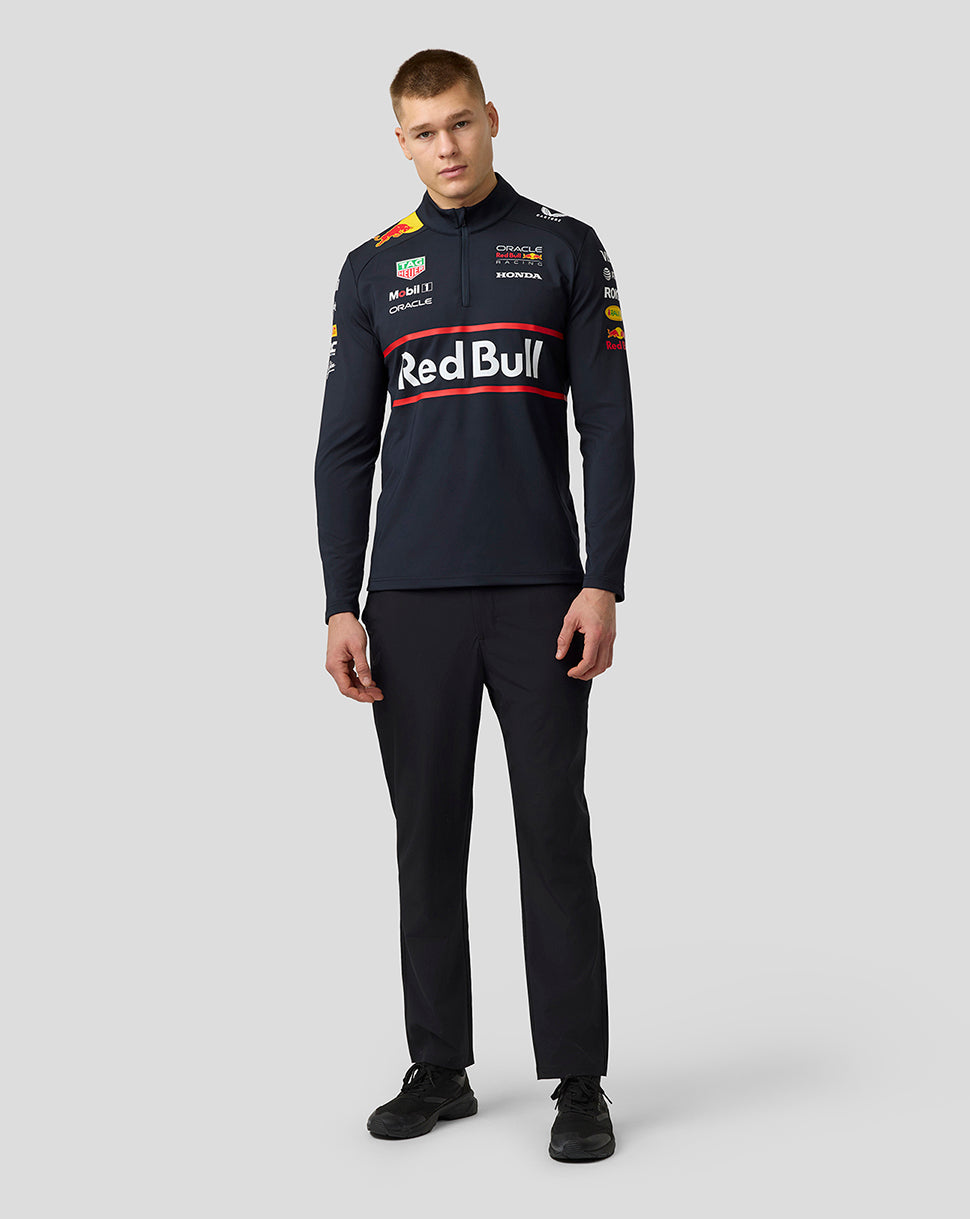 Front view of navy Oracle Red Bull Racing teamline 1/4 zip midlayer displaying Red Bull across the chest and sponsor logos