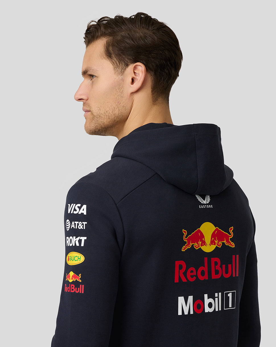 Side profile of navy hoodie showing large Red Bull logo on the back and sponsor decals along the sleeve
