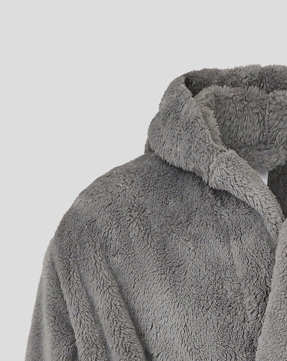 Close up of a gray fluffy junior dressing gown showing the hood and plush texture