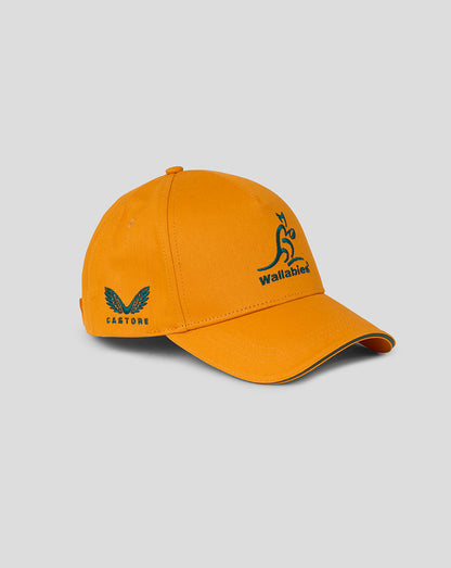 Gold Wallabies cap with teal Wallabies logo on the front and Castore branding on the side.