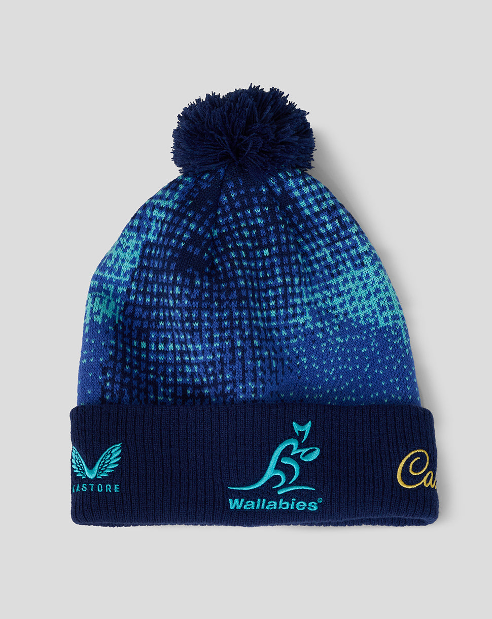Blue knit beanie with pom pom and teal Wallabies logo on the folded cuff