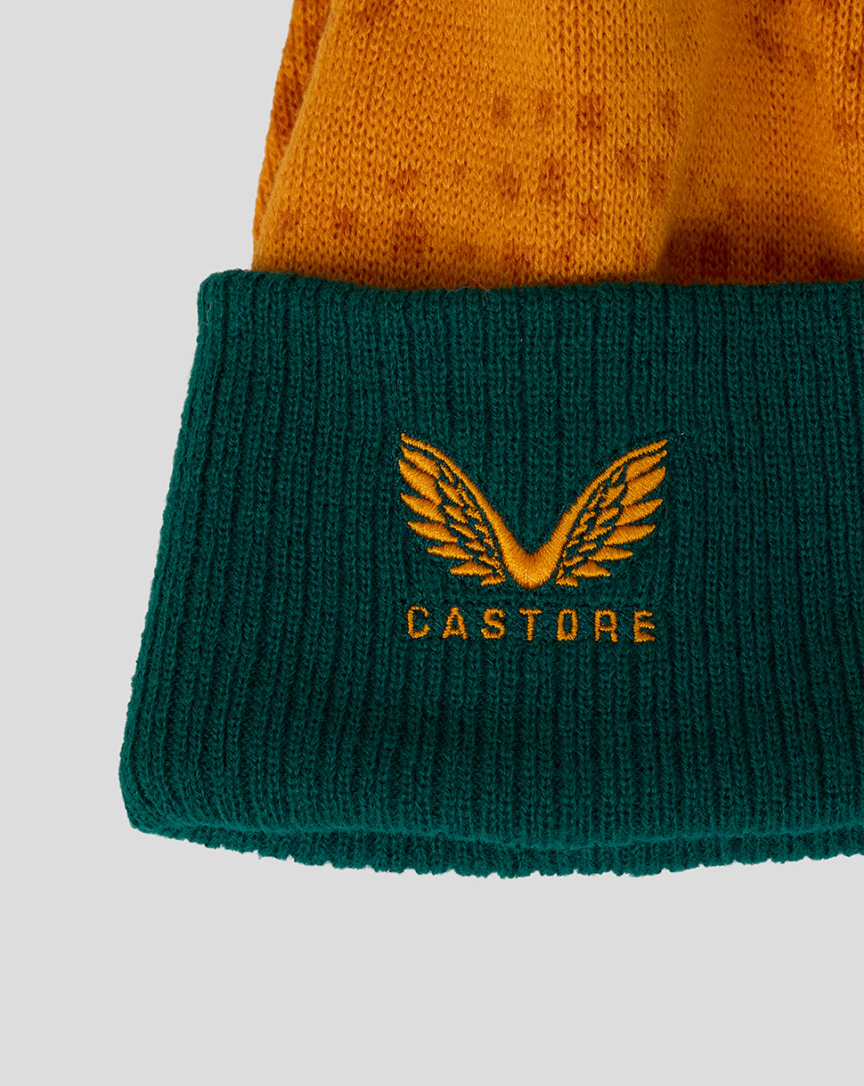 Gold wing emblem and Castore lettering embroidered on the green cuff