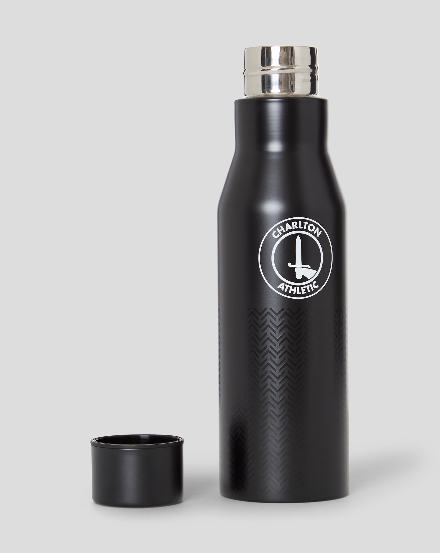 Black Charlton Athletic thermos bottle with silver cap removed and circular white club logo