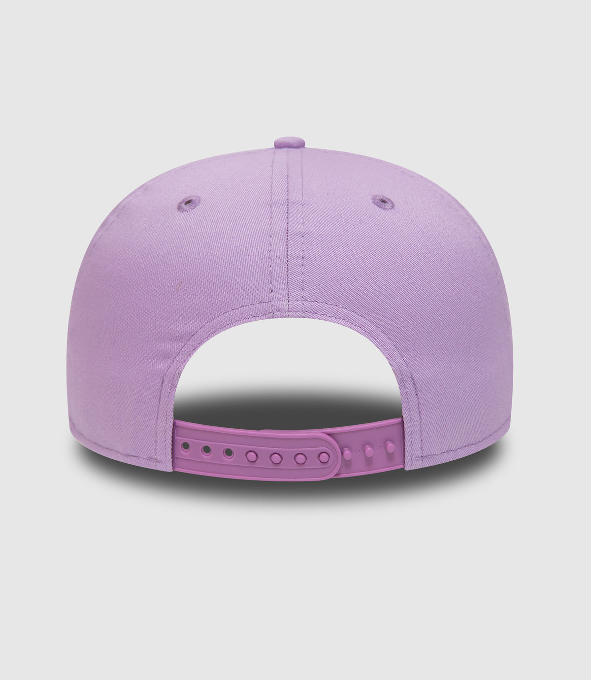Back view of lilac 9FIFTY snapback showing adjustable strap and curved brim