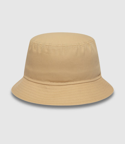 Beige bucket hat close-up focusing on crown stitching and curved brim