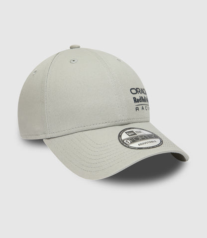 Close up of grey New Era 9FORTY cap crown with center button and stitched eyelets