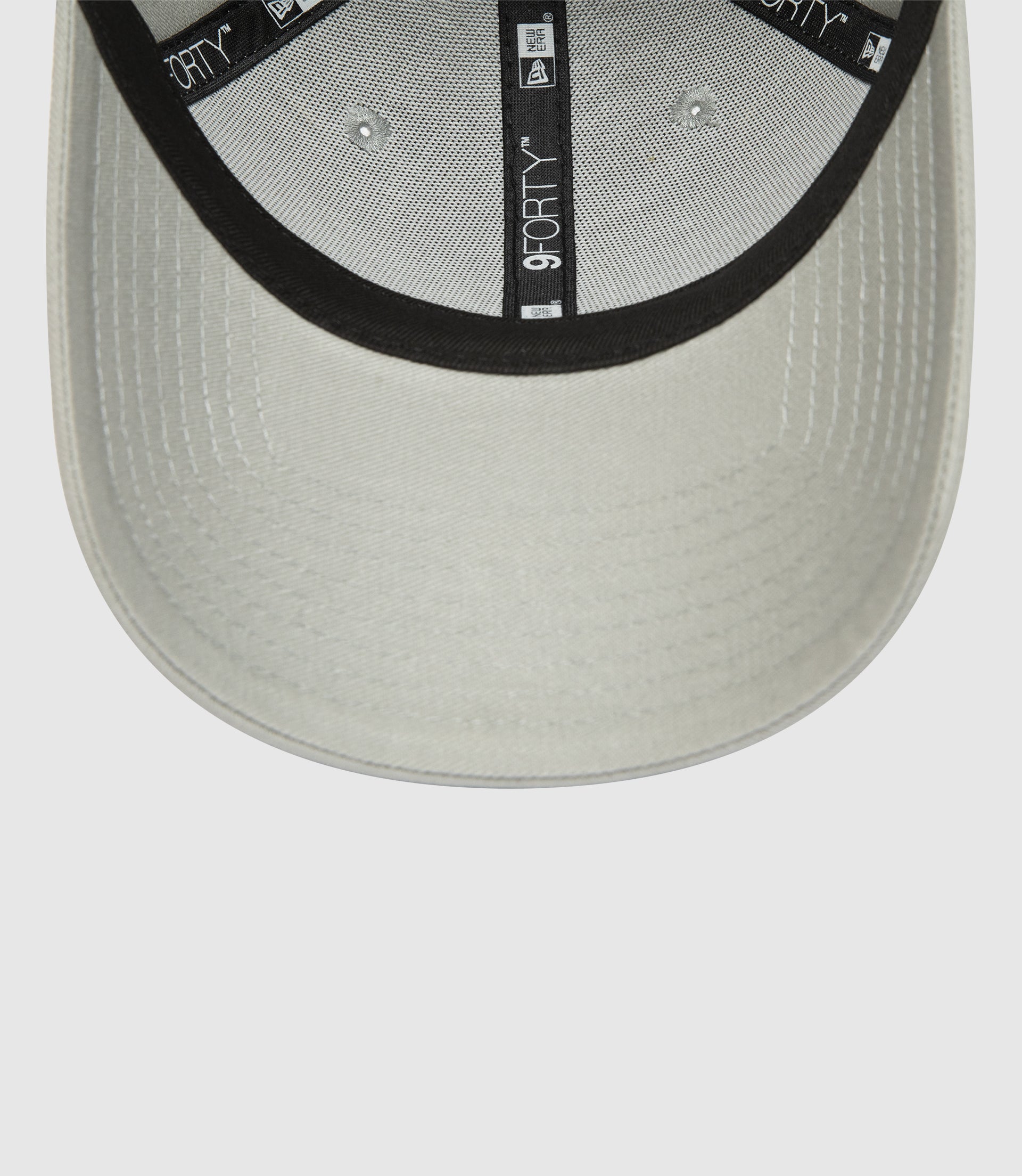 Inside view of a grey Oracle Red Bull Racing 9FORTY cap with black trim and New Era branding