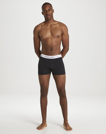 Male model wearing black Castore boxer shorts with white waistband