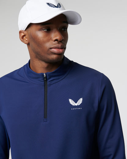 Close up of navy Active Mid Layer 1/4 Zip with chest logo and half zip
