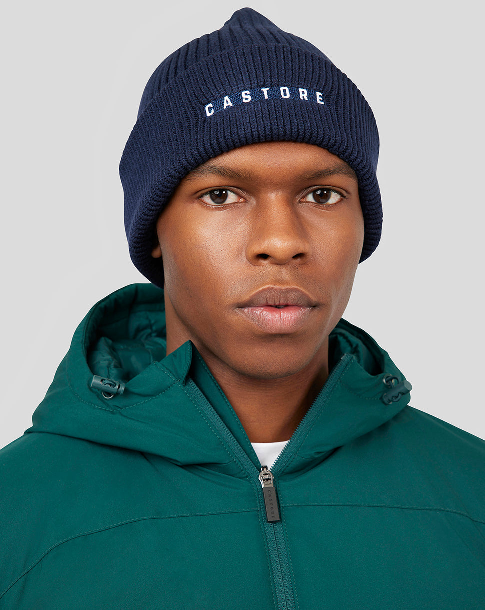 Navy Peacoat Active Beanie with CASTORE embroidery on the front worn by a model.